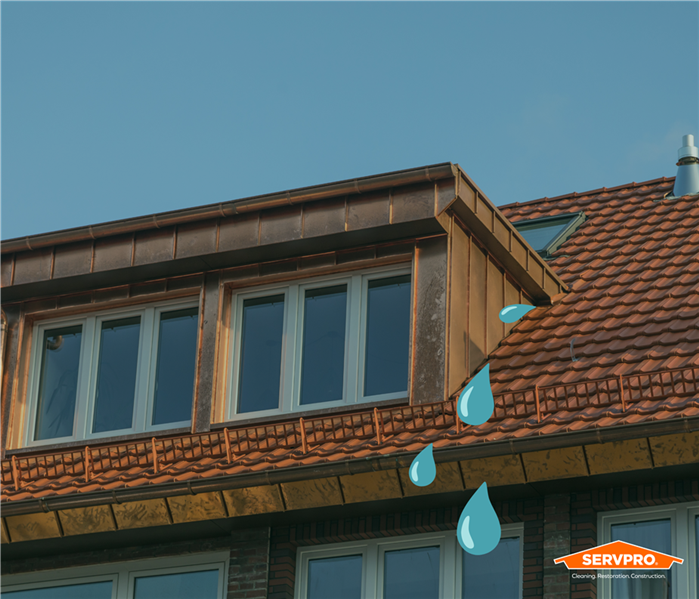 blue water drops coming from the roof of a home in Lake Arlington, TX